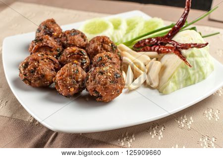 Spicy fried meat ball, Thai east northern style