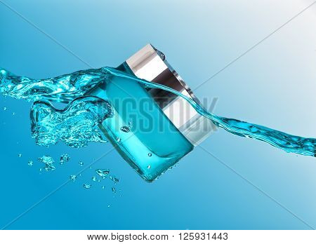 The blue jar of moisturizing cream in the blue water wave  with  air bubbles and water drops on the blue water background