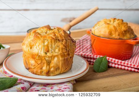 Closeup of a homemade Spanakopita - Greek spinach pie with feta and ricotta
** Note: Shallow depth of field