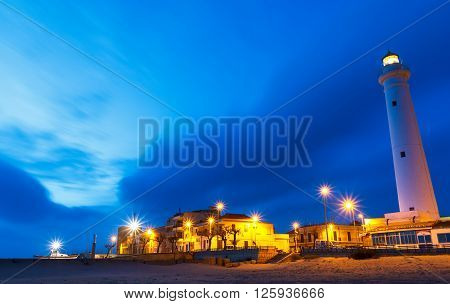 Night at Punta Secca Beach with the lighthouse and the watchtowerTorre Scalambri in Santa Croce Camerina Sicily Italy