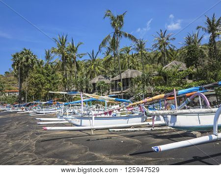 Tropical Beach With Fishing Boats And Palm Trees In Baki