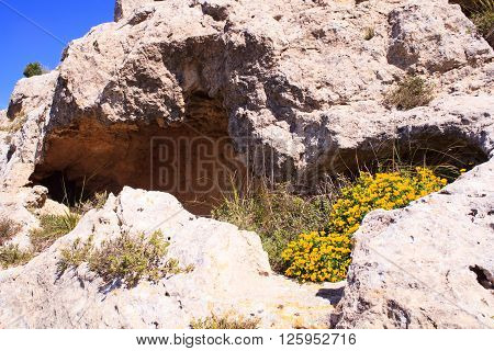 View of the Necropolis of Realmese. Necropoli Pantalicana is an achaeological park in Calascibetta Sicily