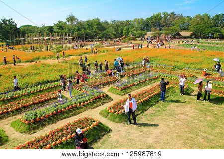 NAKHONRATCHASIMA THAILAND- DECEMBER 14 : people travel in Jim Thompson Farm on DECEMBER 14 2014 in NAKHONRATCHASIMA THAILAND. The House of the world renowned Jim Thompson Thai Silk.