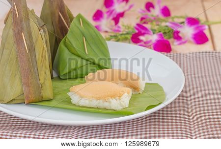 Thailand Sticky rice steamed custard wrapped in banana leaves
