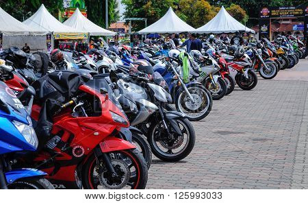 KELANTAN, MALAYSIA -JULY 07, 2012: A number of super bike motorcycle parked in rows in the open area and have been exhibited to the public.