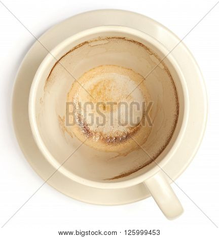 The white empty coffee cup with stained inside isolated on white background.
