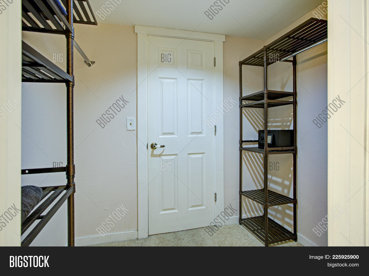 empty walk in closet build in empty walk in closet features clothes racks and metal shelving units image photo free trial bigstock empty walk in closet build in empty walk in closet features clothes racks and metal shelving units image photo free trial bigstock