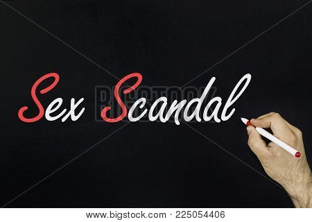 chalk drawing concept 2018. Person's hand drawing with chalk on blackboard. pinay sex scandal