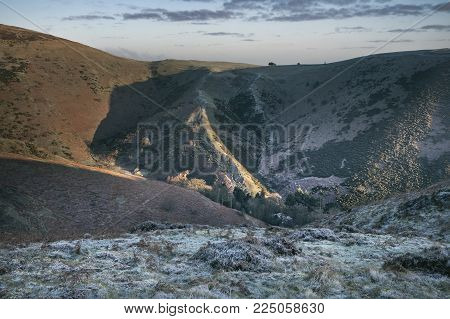 Rural winter landscape, showing the Shropshire hills, clouds and scenic views in the UK on a frosty cold day