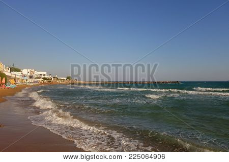 Sunny morning and beach in Kokkini Hani in Crete