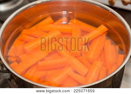 Pan of fresh carrots ready for cooking