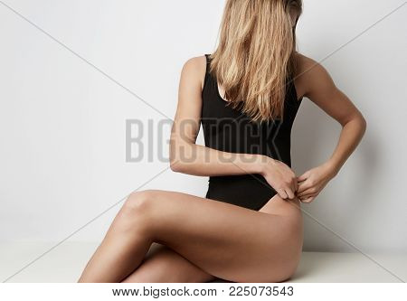 Beautiful slim woman body isolated on white background.