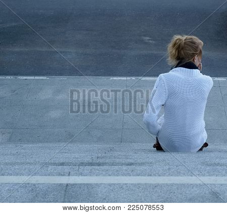 Urban Scene With Woman