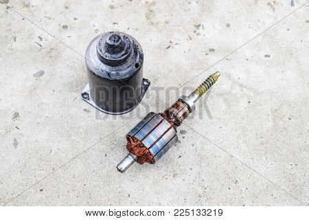 Electric wiper motor for car wipers. Disassembled electric motor.