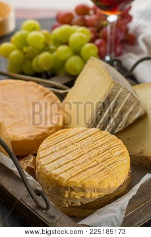 Tasting Of Oldest French Aoc Soft Pudgent Yellow Cheese Livarot,  Munster And Semifirm Tomme French