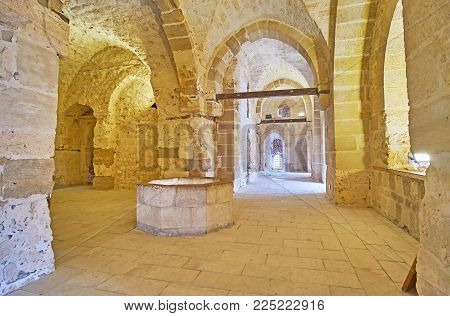 Alexandria, Egypt - December 17, 2017:  The Walk Along The Narrow Corridors Of Qaitbay Castle With T