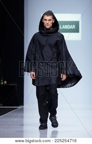 MOSCOW, RUSSIA - MARCH 26, 2017: Model walk runway for DANIIL LANDAR catwalk at Autumn-Winter 2017-2018 Moscow Fashion Week. Men's fashion