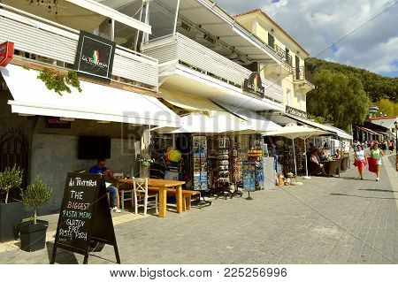 Paxos harbour, Greece - October 01, 2017 : Paxos tourist visiting the small island south of Corfu a Greek island in the Ionian sea
