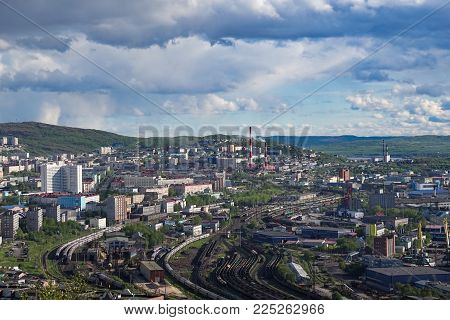 Murmansk, Russia-June 5, 2015: The urban landscape of the Murmansk Soviet architecture and the bright foliage of summer.