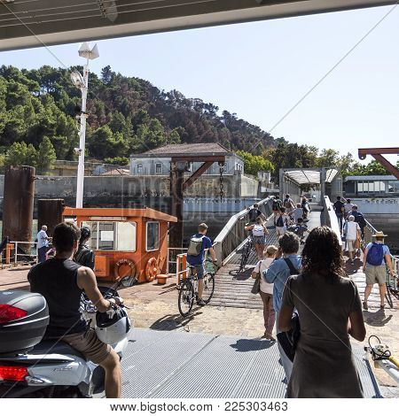 LISBON - October 7, 2017: People disembarking the ferry boat after arrival at Trafaria, Portugal