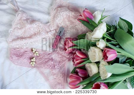 Women's underwear. Pink lace. Spring. Holidays. Flowers. Tulips and roses. Valentine's Day. International Women's Day. Cozy