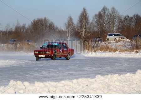 Yoshkar-ola, Russia - January 20, 2018: Winter Auto Show - Drift On Cars On An Ice Track, On A Froze