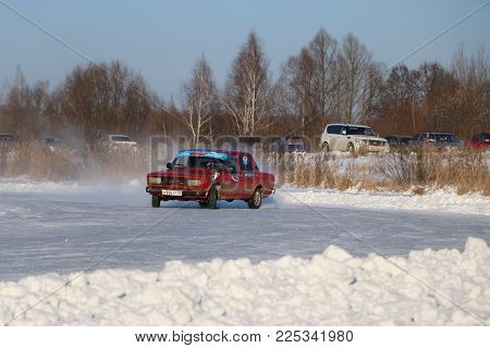 Yoshkar-ola, Russia - January 20, 2018: Winter Auto Show - Drift On Cars On An Ice Track, On A Froze