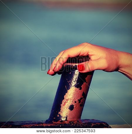 Hand Of Girl With Red Nails On The Yatch With Vintage Style Effect