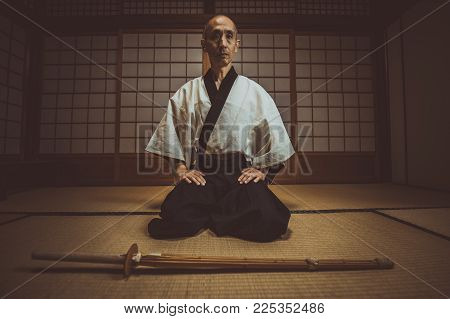 Senior Martial Art Master In His Dojo