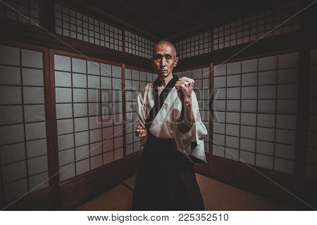 Senior Martial Art Master In His Dojo