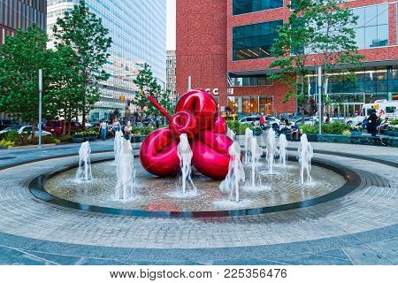 New York, USA - June 08, 2015: Red Balloon Flower by Jeff Koons at 7 World Trade Center on November 10, 2013. It is one of Koons' signature highly polished, public stainless steel sculptures