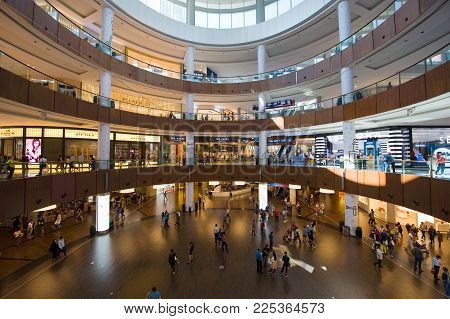 DUBAI, UNITED ARAB EMIRATES - JAN 02, 2018: Dubai shopping mall in the centre with more than 1200 shops is the biggest shopping mall in the world.