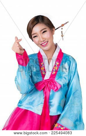 Korean Lady Show Symbol Of Love By Hand, Fingle And Korea Original Dress With Isolated White Backgro