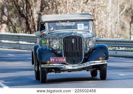 Adelaide, Australia - September 25, 2016: Vintage 1934 Plymouth Pf Roadster Driving On Country Roads