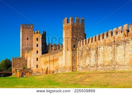 Montagnana - August 2017, Italy: Ancient Walls Of The Medieval Walled Town. Castle Of San Zeno (cast