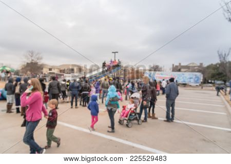 Blurred Giant Snow Tube Inflatable Slide At Community Event In Usa