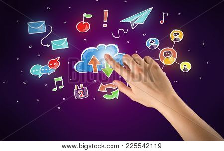 Female hand toucing mixed media icons with purple background
