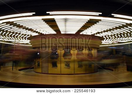 Carousal Merry Go Round Circular Lights Motion Blur Yellow Lights Amusement Fun, Long Exposure