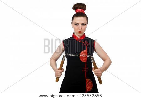 Funny woman with nunchucks isolated on white