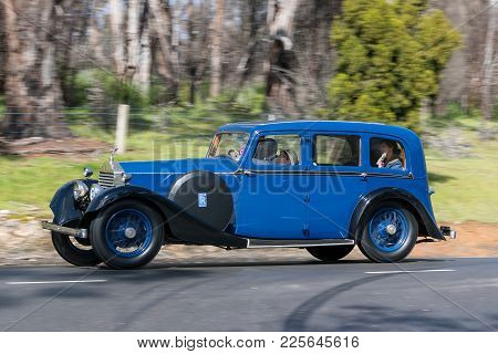 Adelaide, Australia - September 25, 2016: Vintage 1926 Rolls Royce 20 Hp Sedan Driving On Country Ro