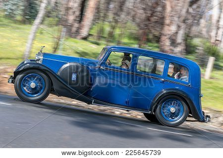 Adelaide, Australia - September 25, 2016: Vintage 1926 Rolls Royce 20 Hp Sedan Driving On Country Ro