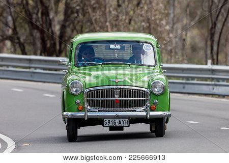 Adelaide, Australia - September 25, 2016: Vintage 1954 Hillman Minx Sedan Driving On Country Roads N