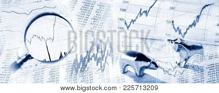 Stock Quotes As Chart And Graph With Magnifier And Bull And Bear