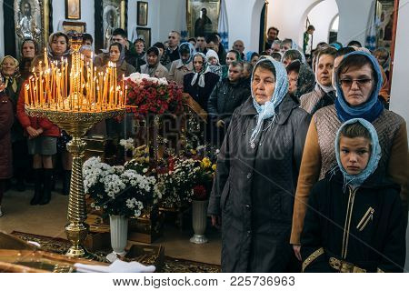 Voyutyn, Volyn / Ukraine - October 14 2017: Ukrainian Parishioners Of The Orthodox Church During Sla