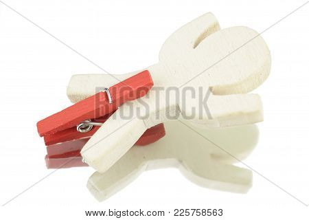 Wooden Male With Red Clothespin On The Legs