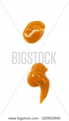 Semicolon Symbol Made Of Sauce Isolated Over The White Background