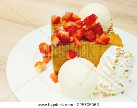 Honey Toast Or Brick Toast With Fresh Strawberry, Vanilla Ice-cream And Whipped Cream