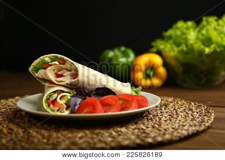 Shaurma Without Sauce With Chicken, Pepper, Lettuce. Low-calorie Roll From Pita Bread, Next To Purpl