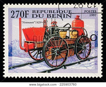Moscow, Russia - February 09, 2018: A Stamp Printed In Benin, Shows Old Steam Locomotive 