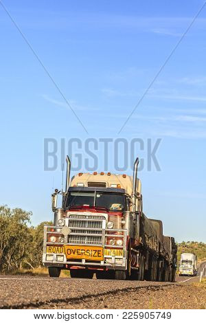 Front View Of Two Road Trains In Convoy On The Barkly Highway, Outback Queensland, Australia.